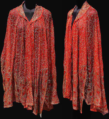 1920s red tulle cloak - Courtesy of poppysvintageclothing