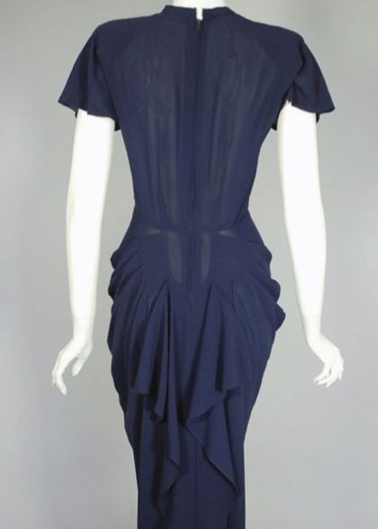 1940s cocktail dress with hip pleats - Courtesy of vivavintageclothing.com