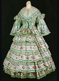 1855 day dress Flounced á Disposition - Courtesy of vintagetextile.com
