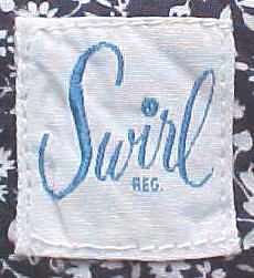 from a 1950s Swirl wrap dress - Courtesy of fuzzylizzie.com