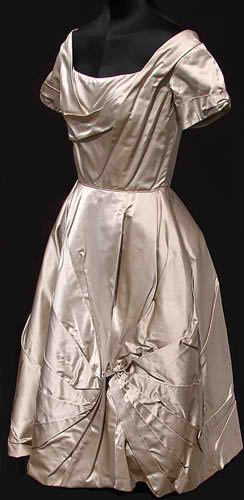  1950s Ceil Chapman cocktail dress - Courtesy of poppysvintageclothing