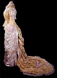  1881 gold reception gown - Courtesy antiquedress.com