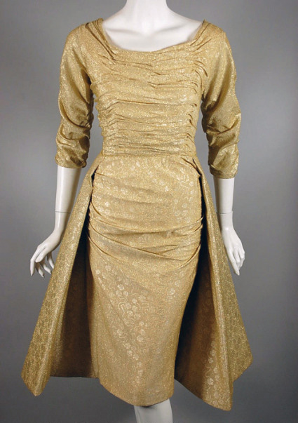 1950s gold metallic brocade dress - Courtesy of vivavintageclothing.com