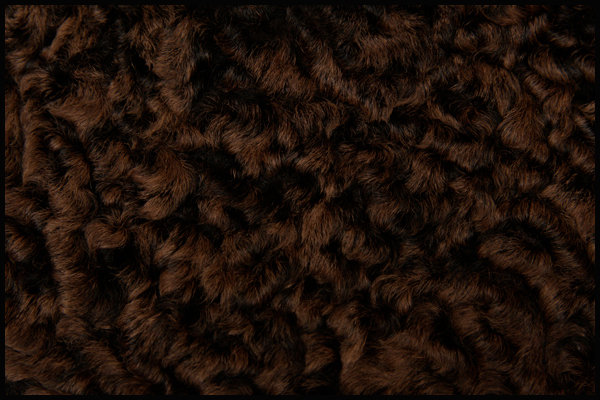 Faux Astrakhan fur (synthetic) - Courtesy of circavintageclothing.com