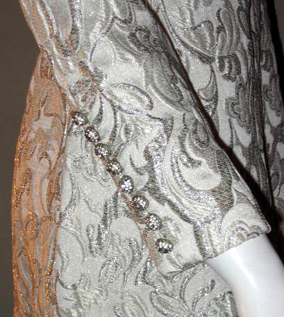 1960s Ceil Chapman silver brocade dress - Courtesy of pinkyagogo
