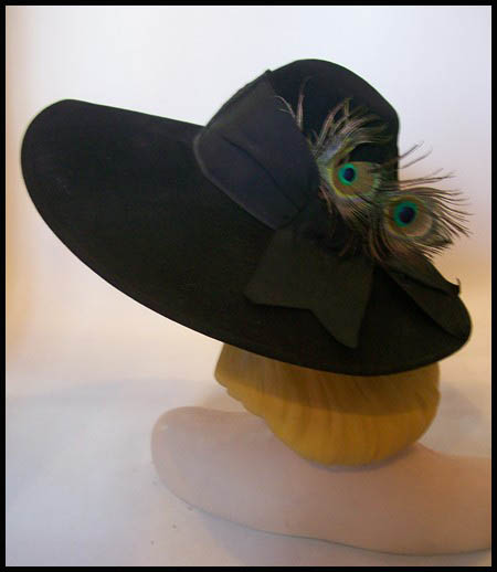 Vintage peacock feather hat - Courtesy of dorotheasclosetvintage.com