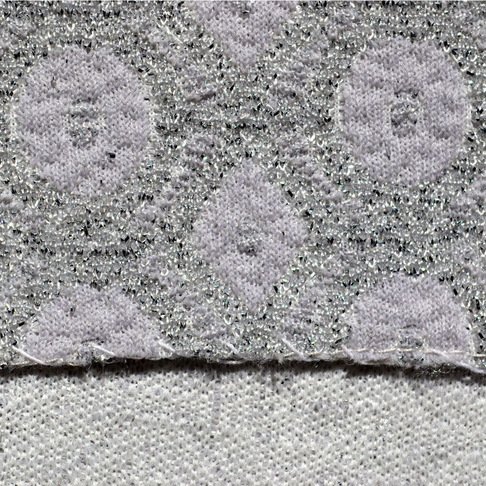 Crimplene with lamé threads; face and reverse