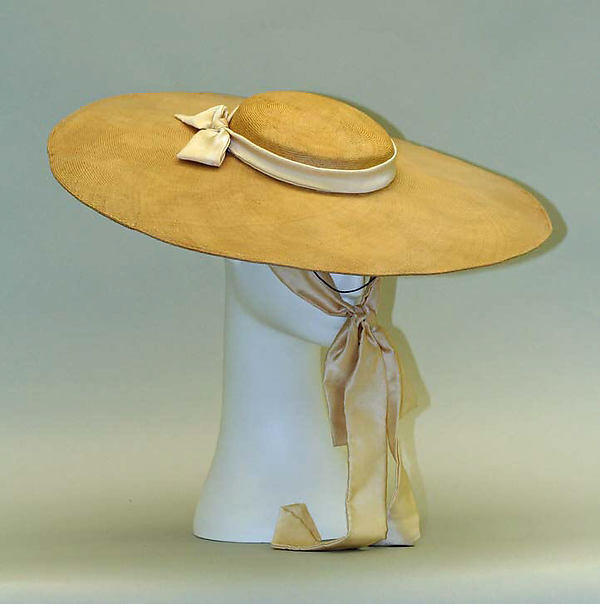1938 Edward Molyneux straw cartwheel hat  - Courtesy of the Metropolitan Museum of Art