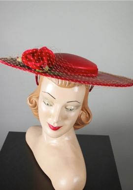 1950s red straw cartwheel hat  - Courtesy of vivavintageclothing
