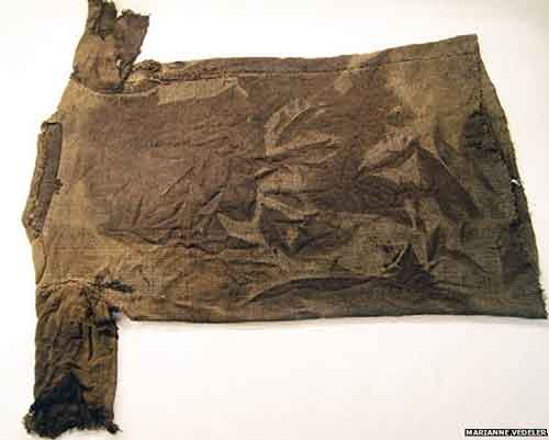The Tunic Dates From 230 to 390 A.D. The Iron Age wool tunic shows carefully darned repairs and minor patchwork.