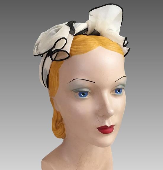1960s white head scarf  - Courtesy of thevintagemerchant