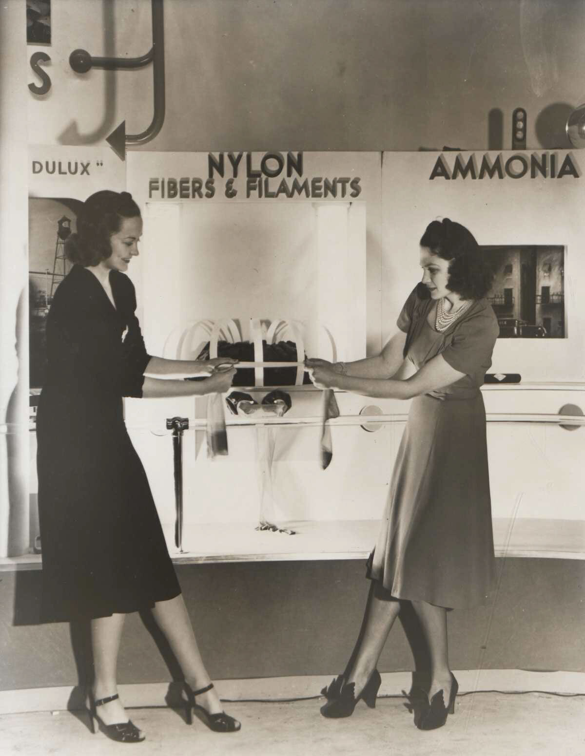 Pair of women demonstrating nylon stockings 1939