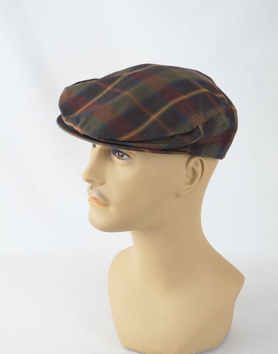 1950s plaid driving cap  -  Courtesy of alleycatsvintage
