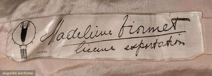from a 1930s silk gown with Madelienne Vionnet license exportation in script - Courtesy of Augusta Auctions