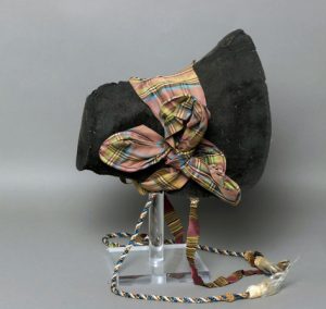 brown hat with plaid ribbon, worn by bride, 1830